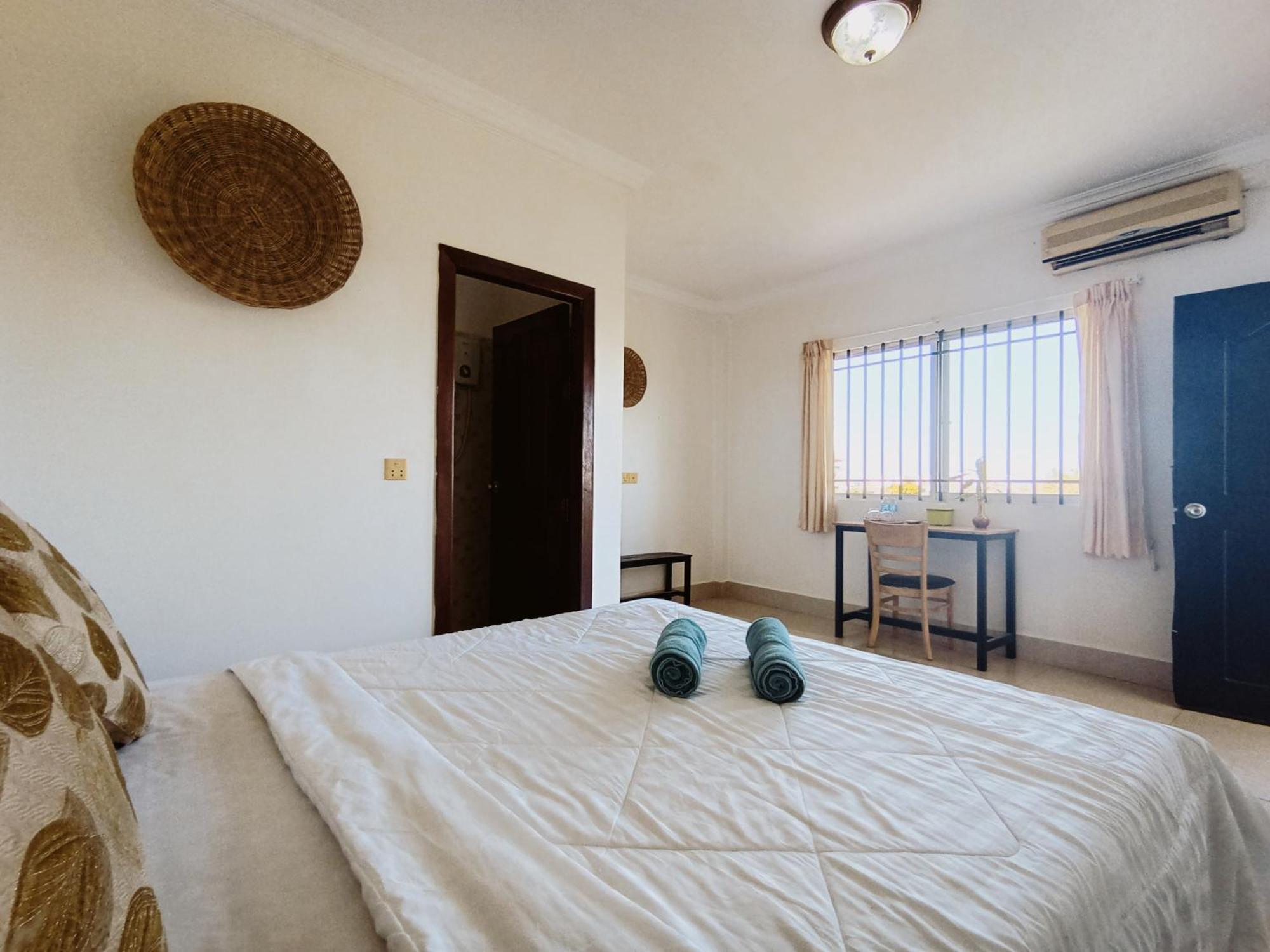 A Pousada Bed & Bedzzz Siem Reap Quarto foto